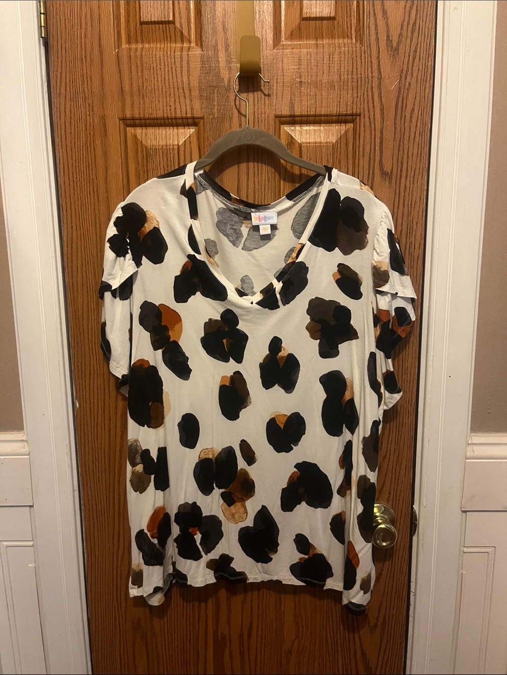 LuLaRoe Cream Top with Black and Brown Spot Pattern